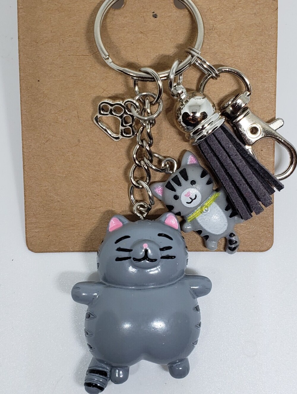 Handmade painted resin gray tabby cat paw keychain